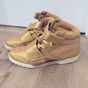 Gold Reebok hi-tops